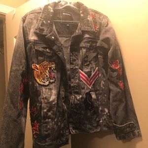 Black denim jacket with patches